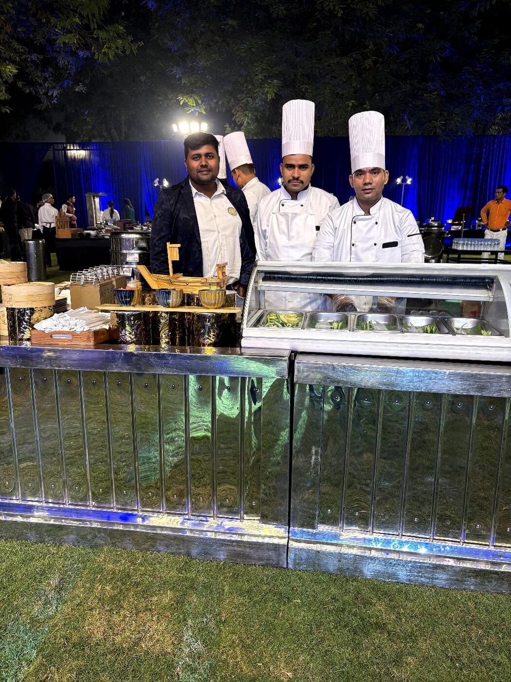 Sushiya team at outdoor wedding counter